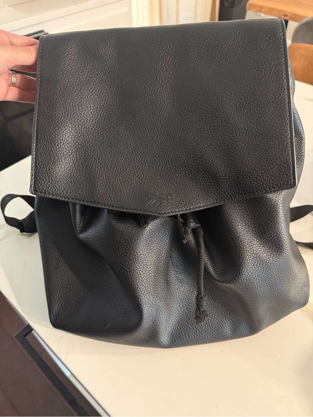 Freshly Picked Black Pebbled Leather Drawstring Backpack